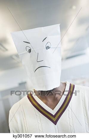 Businessman wearing a paper bag of sad face View Large Photo Image Stock Photo - Businessman wearing a paper bag of sad face. Fotosearch
