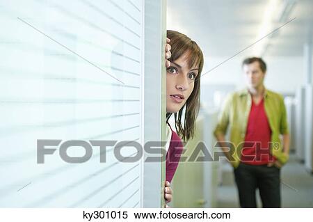 Businesswoman in an office corridor View Large Photo Image Stock Photography - Businesswoman in an office corridor. Fotosearch