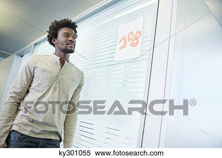 Male candidate waiting for a job interview outside a cabin View Large Photo Image Stock Photography - Male candidate waiting for a job interview outside a cabin. Fotosearch