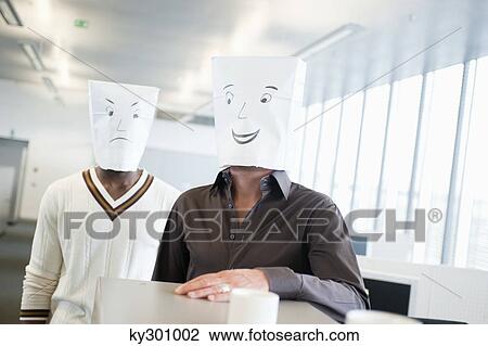 Two businessmen wearing paper bags of happy and sad faces View Large Photo Image Stock Image - Two businessmen wearing paper bags of happy and sad faces. Fotosearch