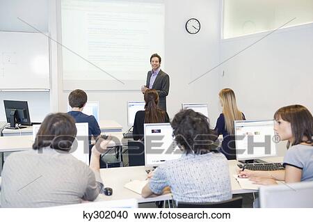 Business executives in a training class View Large Photo Image Stock Image - Business executives in a training class. Fotosearch