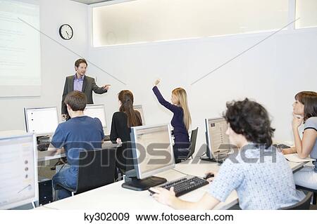 Business executives in a training class View Large Photo Image Stock Photo - Business executives in a training class. Fotosearch