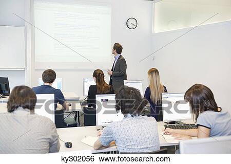 Business executives in a training class View Large Photo Image Stock Photograph - Business executives in a training class. Fotosearch