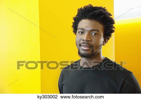 Portrait of a businessman in an office View Large Photo Image Stock Image - Portrait of a businessman in an office. Fotosearch