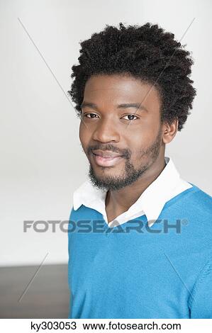 Portrait of a man smiling View Large Photo Image Stock Image - Portrait of a man smiling. Fotosearch