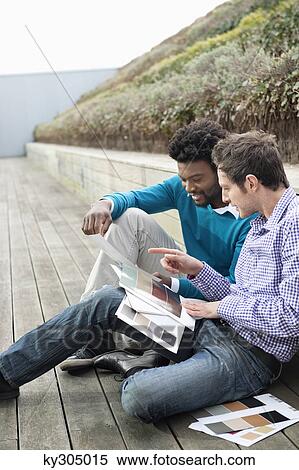 Friends choosing color swatches View Large Photo Image Stock Photography - Friends choosing color swatches. Fotosearch