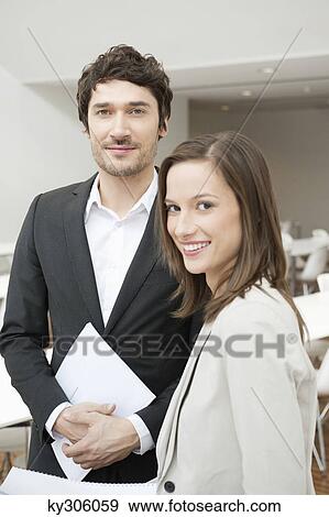 Portrait of two business executives smiling View Large Photo Image Stock Photo - Portrait of two business executives smiling. Fotosearch