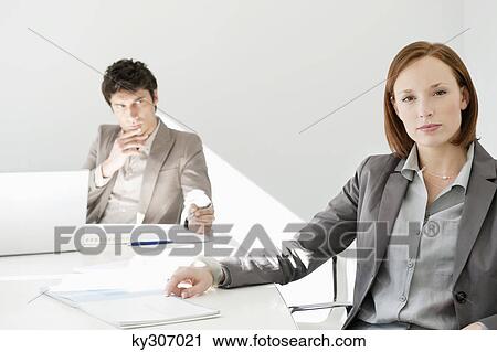 Business executives in a conference room View Large Photo Image Stock Image - Business executives in a conference room. Fotosearch