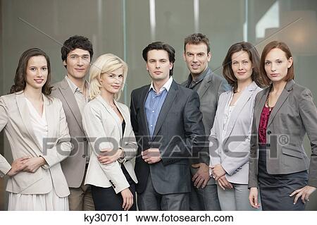 Business executives standing together View Large Photo Image Stock Image - Business executives standing together. Fotosearch
