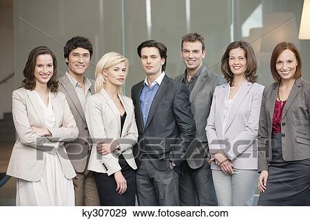 Business executives standing together View Large Photo Image Stock Photo - Business executives standing together. Fotosearch