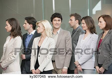 Business executives standing together View Large Photo Image Stock Photography - Business executives standing together. Fotosearch