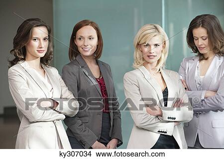 Businesswomen standing together View Large Photo Image Picture - Businesswomen standing together. Fotosearch