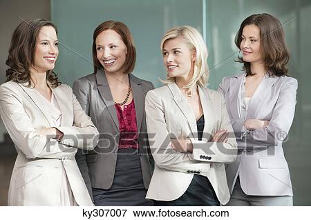 Businesswomen standing together View Large Photo Image Stock Photo - Businesswomen standing together. Fotosearch
