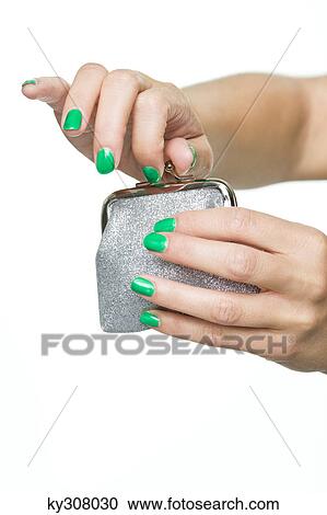 Close-up of woman's hands opening purse View Large Photo Image Stock Image - Close-up of woman's hands opening purse. Fotosearch