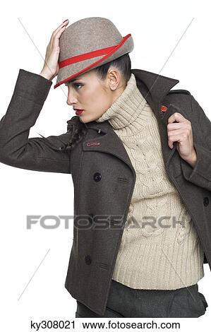 Young woman wearing jacket and fedora View Large Photo Image Stock Image - Young woman wearing jacket and fedora. Fotosearch
