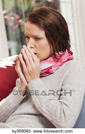 Young woman coughing View Large Photo Image Stock Photography - Young woman coughing. Fotosearch