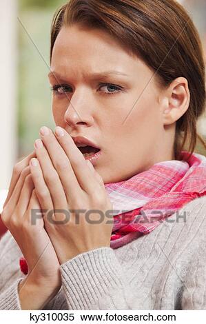 Young woman coughing View Large Photo Image Stock Photography - Young woman coughing. Fotosearch