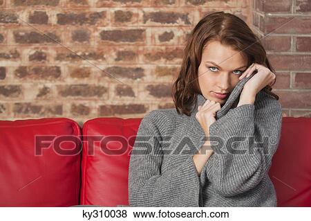 Young woman looking at camera View Large Photo Image Stock Photo - Young woman looking at camera. Fotosearch