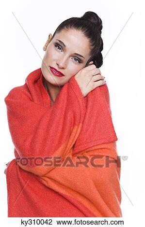 Young woman wrapped in blanket View Large Photo Image Stock Image - Young woman wrapped in blanket. Fotosearch