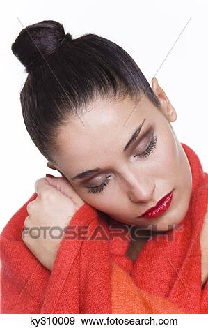 Young woman wrapped in blanket View Large Photo Image Stock Photo - Young woman wrapped in blanket. Fotosearch