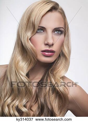 Young woman looking away View Large Photo Image Stock Photo - Young woman looking away. Fotosearch