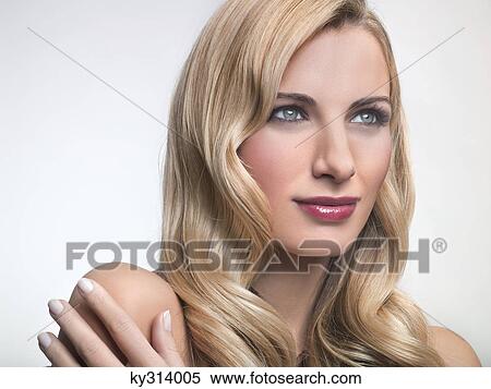 Young woman looking away View Large Photo Image Stock Photography - Young woman looking away. Fotosearch