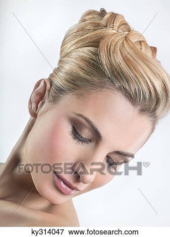 Young woman with eyes closed View Large Photo Image Stock Photo - Young woman with eyes closed. Fotosearch