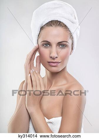 Young woman wrapped in towels View Large Photo Image Picture - Young woman wrapped in towels. Fotosearch