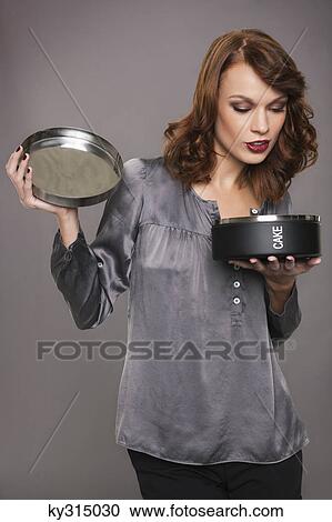 Young woman opening box View Large Photo Image Stock Image - Young woman opening box. Fotosearch