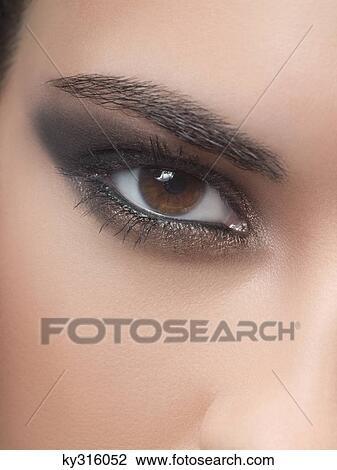 Stock Image - Close-up of woman's eye. Fotosearch