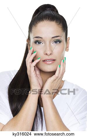 Portrait of young woman with hands on chin View Large Photo Image Picture - Portrait of young woman with hands on chin. Fotosearch