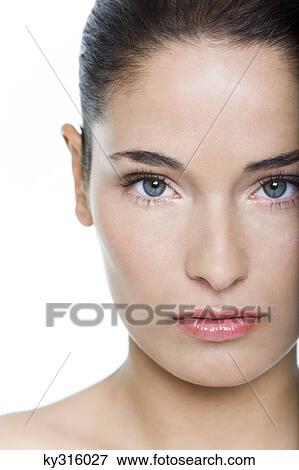 Young woman looking at camera View Large Photo Image Stock Photo - Young woman looking at camera. Fotosearch