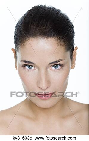 Young woman looking at camera View Large Photo Image Stock Photography - Young woman looking at camera. Fotosearch