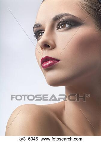 Young woman looking away View Large Photo Image Stock Photography - Young woman looking away. Fotosearch