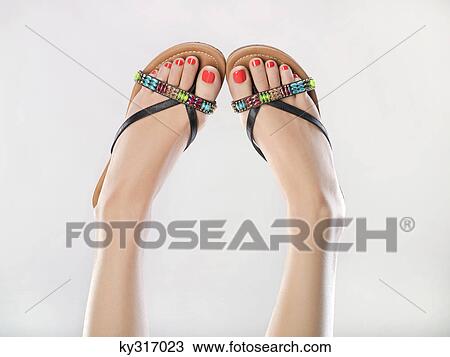 Woman's legs in the air View Large Photo Image Stock Image - Woman's legs in the air. Fotosearch