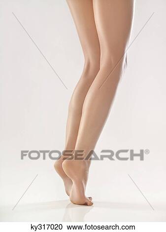 Stock Image - Woman's legs. Fotosearch