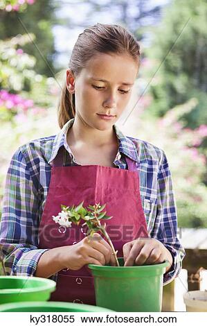 Girl gardening and thinking View Large Photo Image Stock Photography - Girl gardening and thinking. Fotosearch