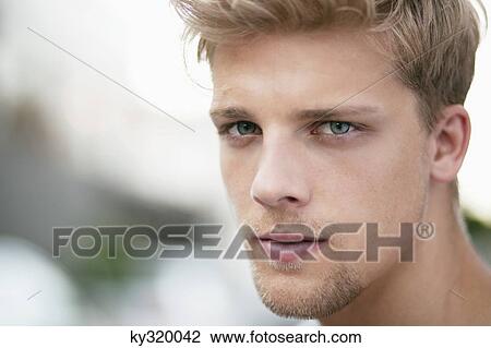 Portrait of a young man View Large Photo Image Stock Image - Portrait of a young man. Fotosearch