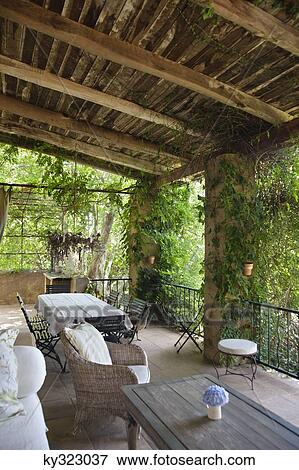 Balcony covered with creepers View Large Photo Image Stock Photo - Balcony covered with creepers. Fotosearch