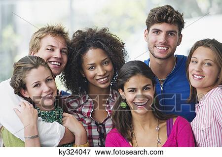 Portrait of multi-ethnic university students standing together View Large Photo Image Stock Photo - Portrait of multi-ethnic university students standing together. Fotosearch