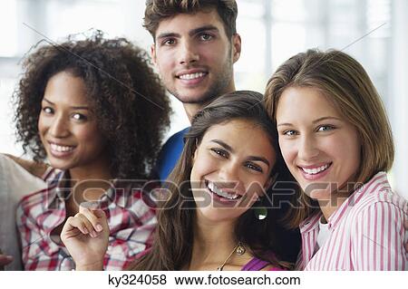 Portrait of multi-ethnic university students standing together View Large Photo Image Stock Photo - Portrait of multi-ethnic university students standing together. Fotosearch