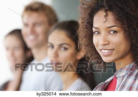 Close-up of a university student with her friends View Large Photo Image Picture - Close-up of a university student with her friends. Fotosearch