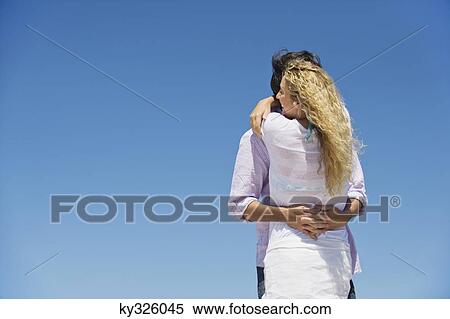 Stock Photography - Couple embracing each other. Fotosearch