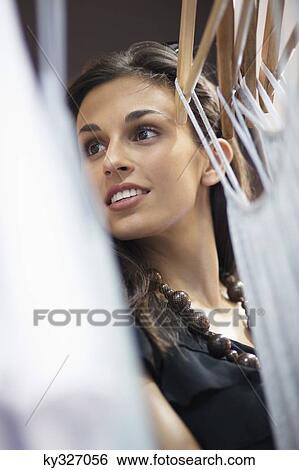Beautiful young woman shopping View Large Photo Image Stock Photograph - Beautiful young woman shopping. Fotosearch