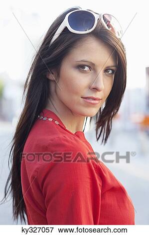 Stock Photo - Portrait of a beautiful young woman. Fotosearch