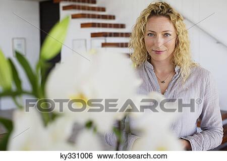 Portrait of a mid adult woman View Large Photo Image Stock Photograph - Portrait of a mid adult woman. Fotosearch