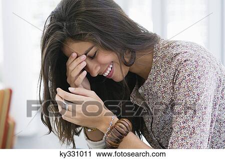 Side profile of a beautiful woman smiling with her eyes closed View Large Photo Image Stock Image - Side profile of a beautiful woman smiling with her eyes closed. Fotosearch