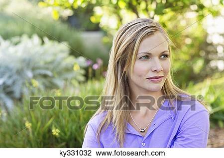 Young woman day dreaming View Large Photo Image Stock Image - Young woman day dreaming. Fotosearch