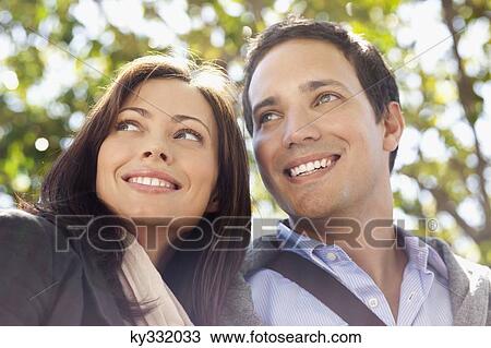 Close-up of a happy couple View Large Photo Image Stock Image - Close-up of a happy couple. Fotosearch