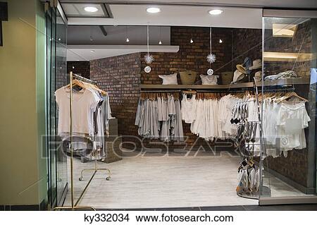 Interiors of a clothing store View Large Photo Image Picture - Interiors of a clothing store. Fotosearch